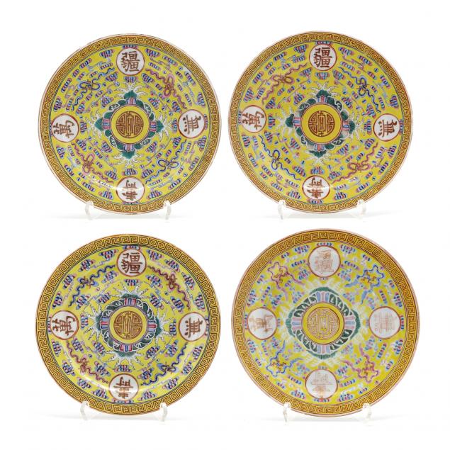a-group-of-four-chinese-porcelain-famille-jaune-birthday-plates