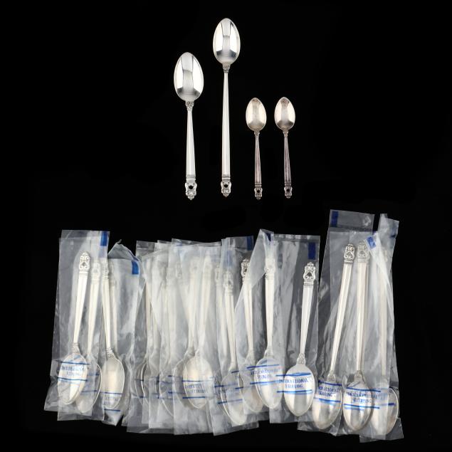 a-collection-of-24-international-royal-danish-silver-spoons