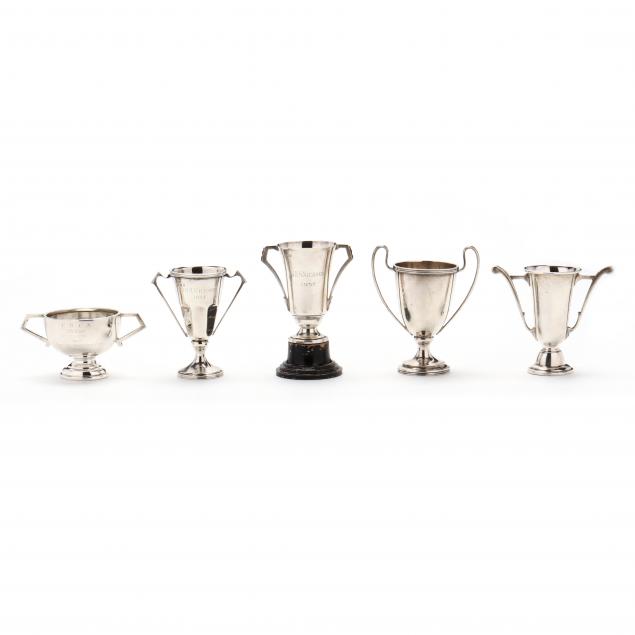 a-collection-of-five-20th-century-english-silver-cabinet-trophies