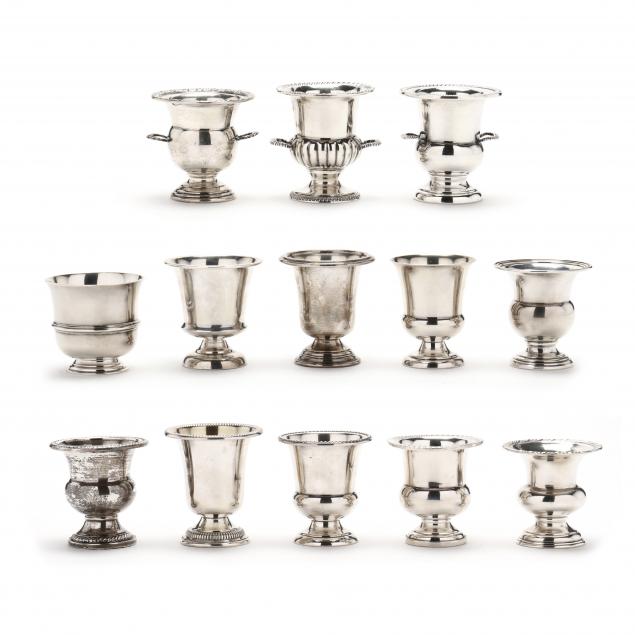 a-grouping-of-thirteen-sterling-silver-cigarette-urns