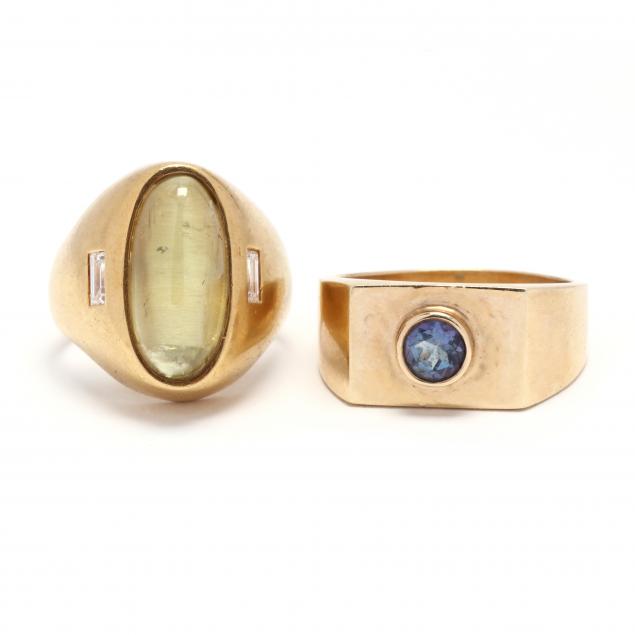 two-gold-and-gem-set-rings