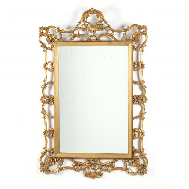 a-rococo-style-carved-and-gilt-wall-mirror