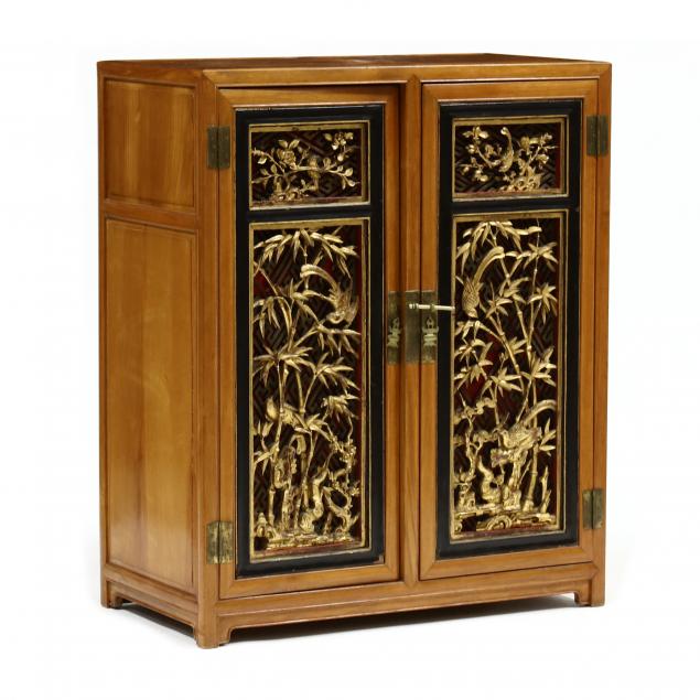 chinese-carved-and-parcel-gilt-hardwood-cabinet