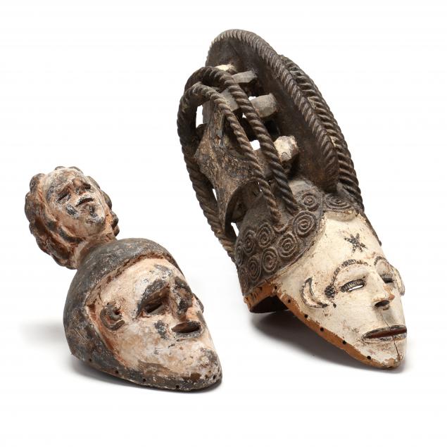 nigerian-igbo-spirit-mask-and-unidentified-mask-surmounted-by-janiform-head