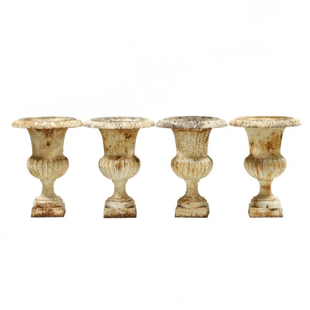 four-classical-style-cast-iron-garden-urns