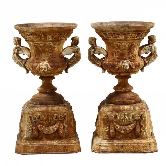 pair-of-classical-style-figural-handled-iron-urns-on-stands