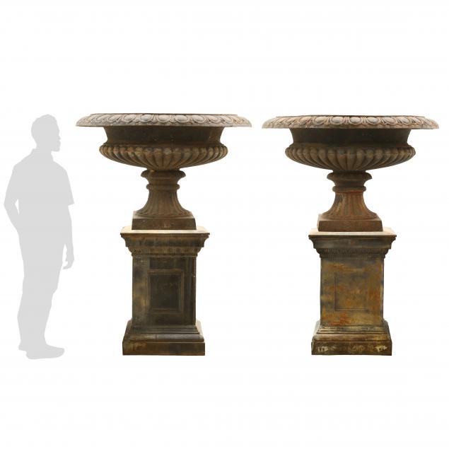a-palatial-sized-pair-of-classical-style-iron-urns-on-stands