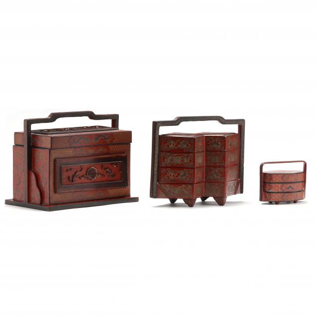 three-chinese-red-lacquer-stacking-boxes-with-auspicious-motifs
