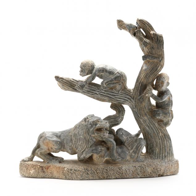 vintage-african-folk-art-stone-sculpture-of-figures-and-lion