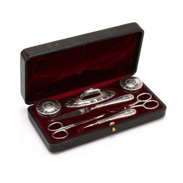 a-cased-sterling-silver-nail-grooming-set-by-tiffany-co