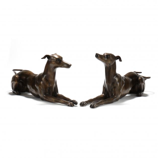 a-pair-of-life-size-bronze-statues-of-reclining-greyhounds
