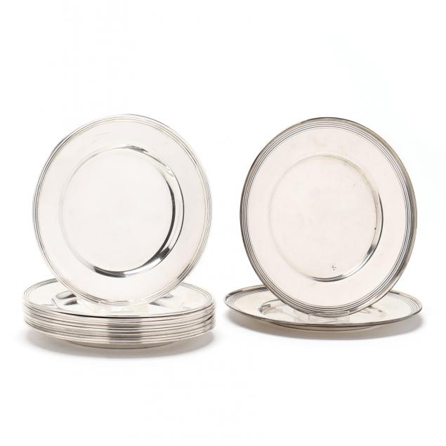 an-assembled-set-of-14-sterling-silver-bread-plates