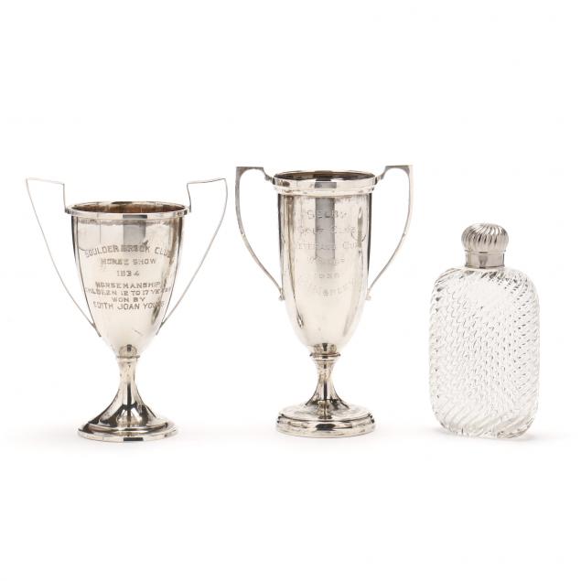 two-sterling-silver-trophies-and-a-glass-flask