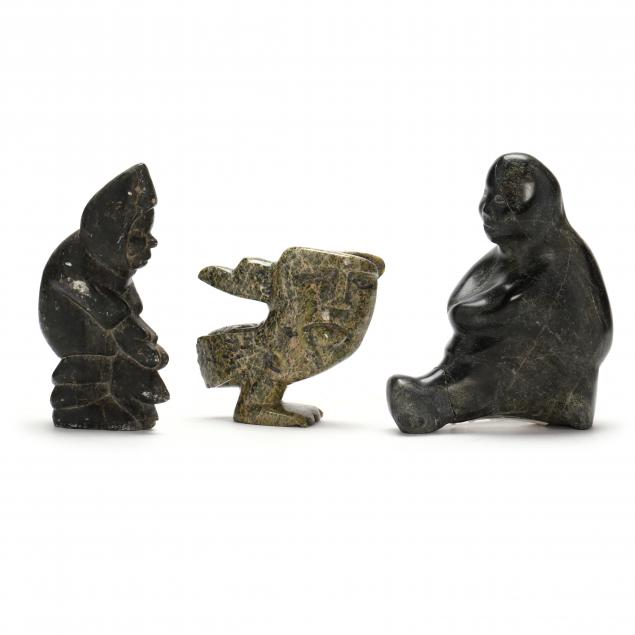 three-inuit-stone-sculptures