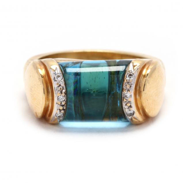 gold-blue-stone-and-diamond-saddle-ring