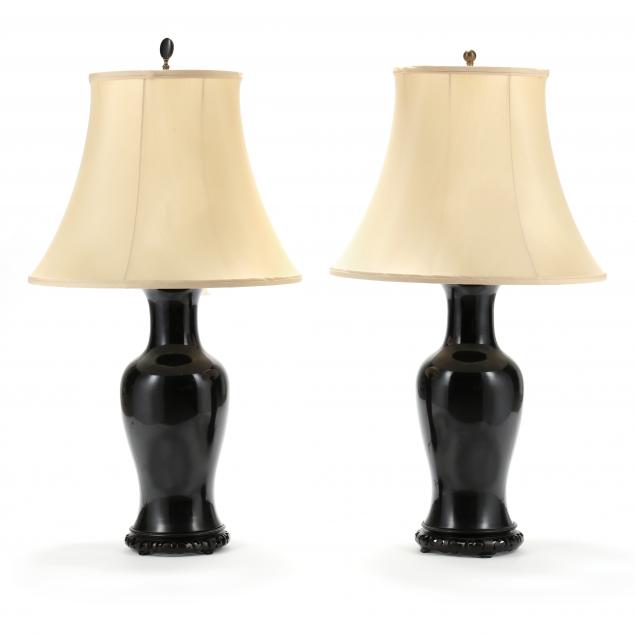 a-pair-of-large-black-mirror-glazed-monochrome-vase-lamps