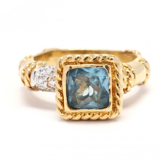 gold-and-blue-topaz-ring-cassis