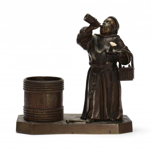 bronze-cigarette-holder-and-figural-lighter