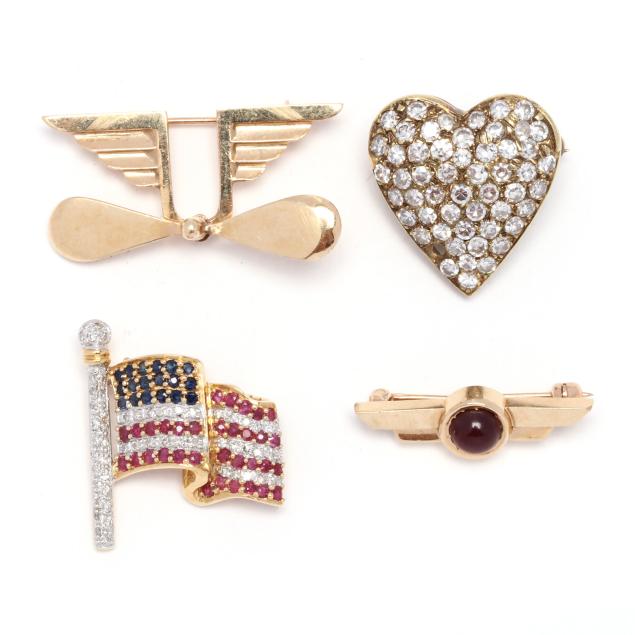 four-gold-brooches