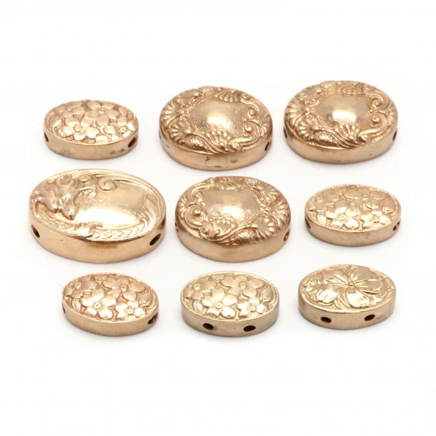 collection-of-nine-gold-slide-charms