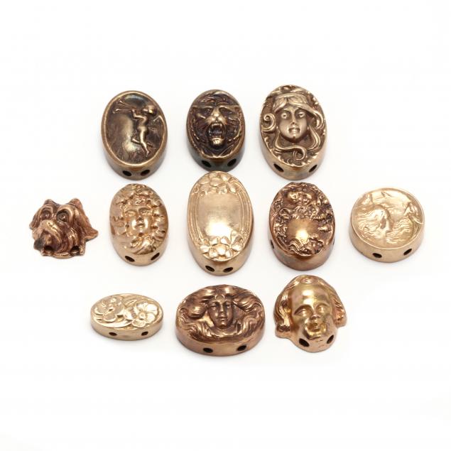 group-of-eleven-vintage-gold-slide-charms