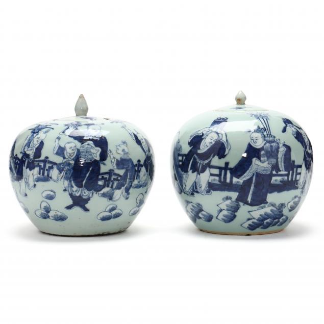 a-pair-of-chinese-celadon-ground-blue-and-white-jars-with-covers