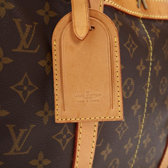 At Auction: Louis Vuitton, Louis Vuitton Sac Souple Travel Bag