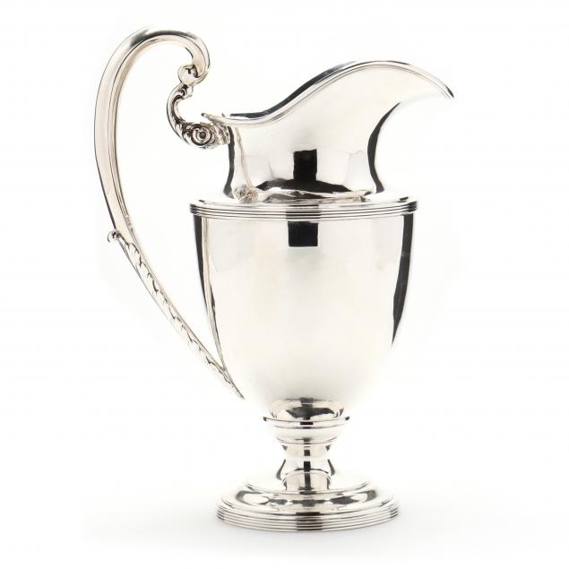 a-sterling-silver-water-pitcher-retailed-by-j-e-caldwell-co