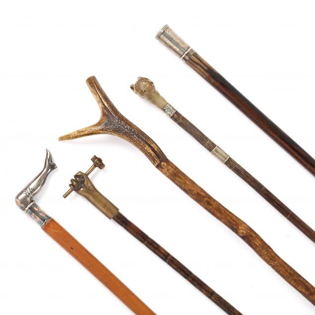 a-collection-of-five-vintage-canes