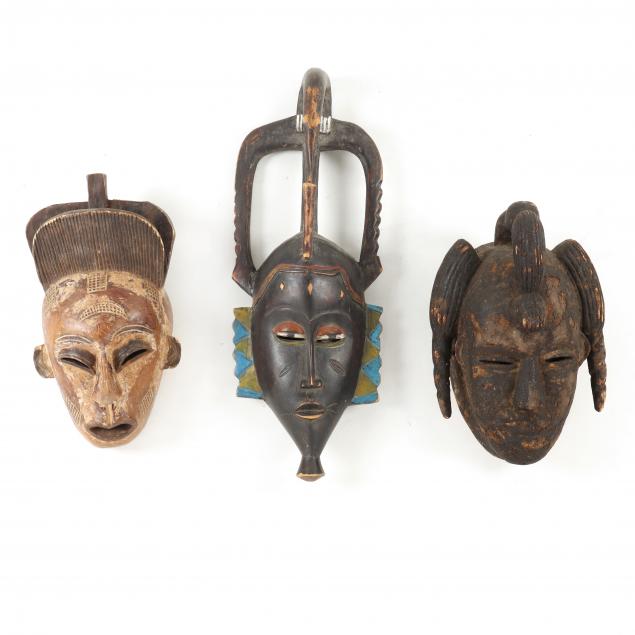 three-west-african-carved-wooden-masks