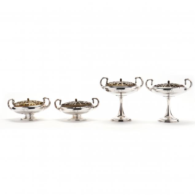 a-set-of-four-sterling-silver-compotes-tazzas-with-flower-frogs