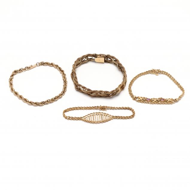 four-gold-bracelets
