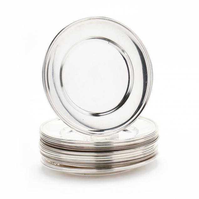 a-collection-of-17-sterling-silver-bread-plates