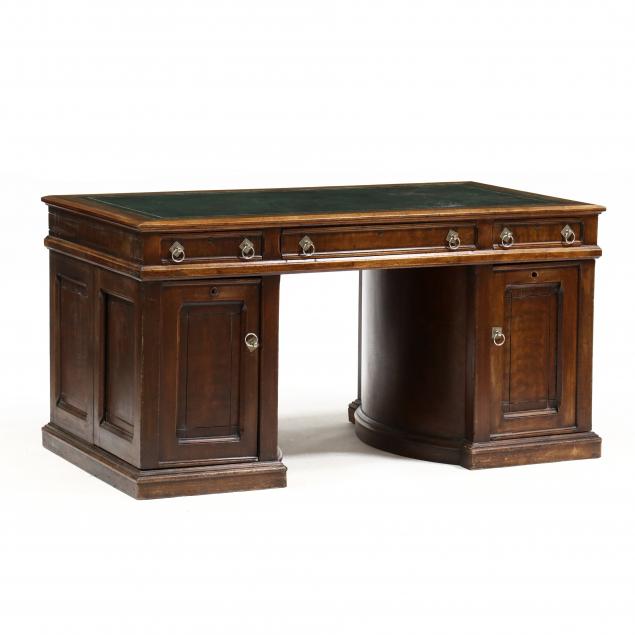attributed-wooton-walnut-rotary-executive-desk