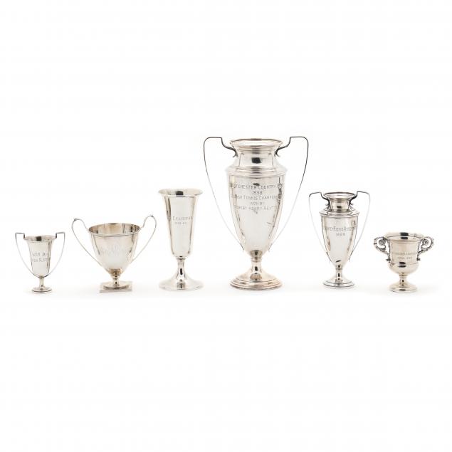 a-grouping-of-six-american-sterling-silver-trophies
