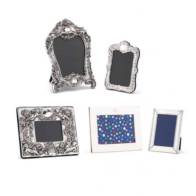 a-collection-of-five-sterling-silver-frames