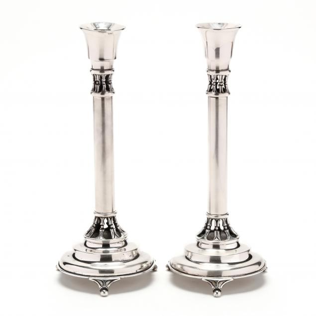 a-pair-of-judaica-sterling-silver-shabbat-candlesticks