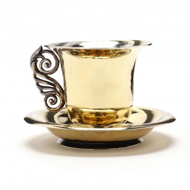 a-continental-silver-cup-and-saucer-with-gilt-wash