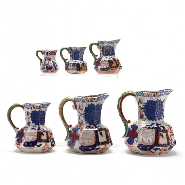 six-english-ironstone-graduated-pitchers