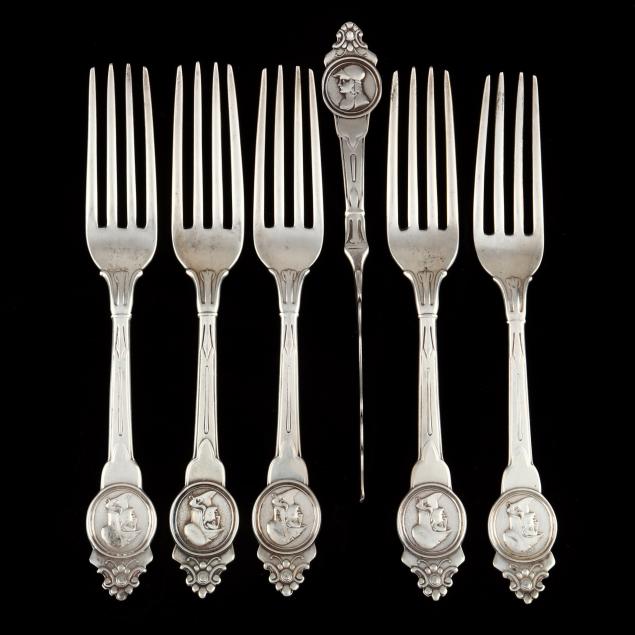 six-american-coin-silver-medallion-flatware-pieces-by-john-cook