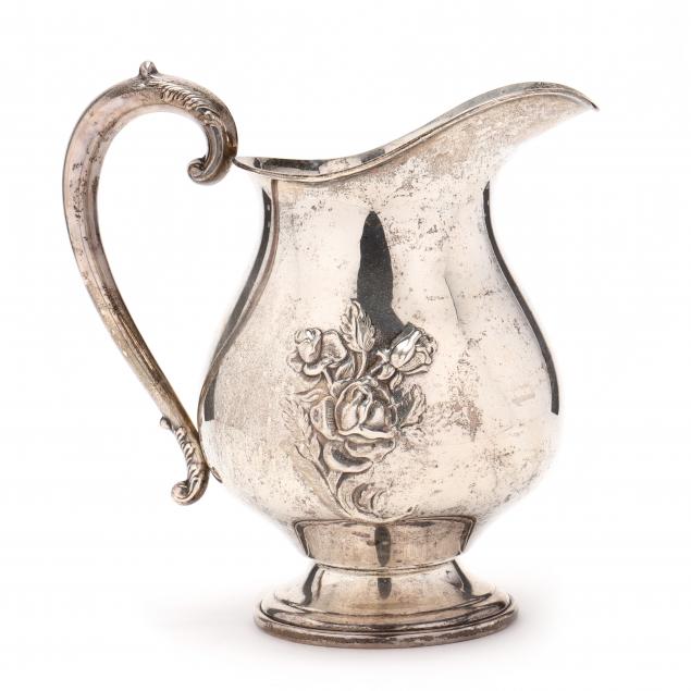 a-vintage-sterling-silver-water-pitcher-with-rose-motif