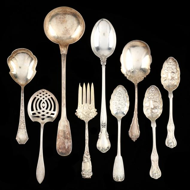 a-collection-of-nine-sterling-silver-and-silver-plated-serving-pieces