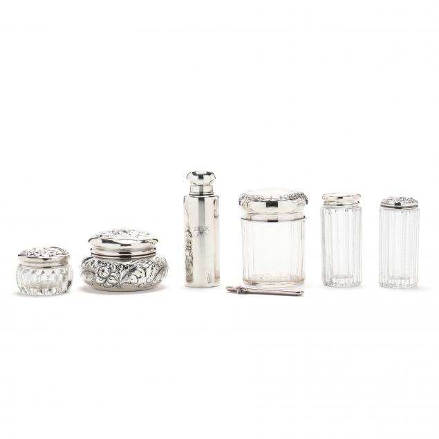 a-collection-of-seven-continental-american-silver-and-glass-dresser-items
