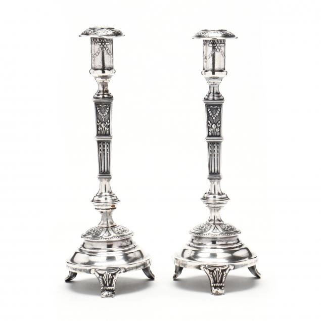 a-pair-of-polish-800-silver-repousse-candlesticks