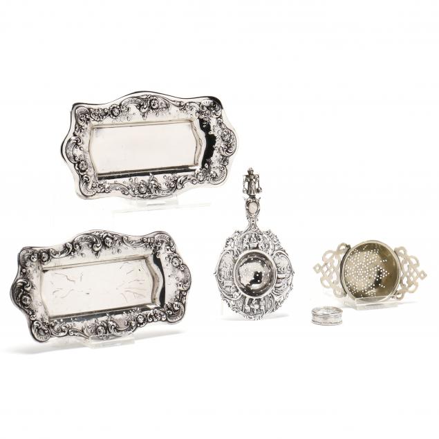 five-assorted-silver-table-accessories