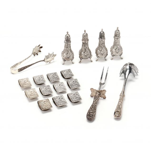a-collection-of-18-kirk-repousse-sterling-silver-table-accessories