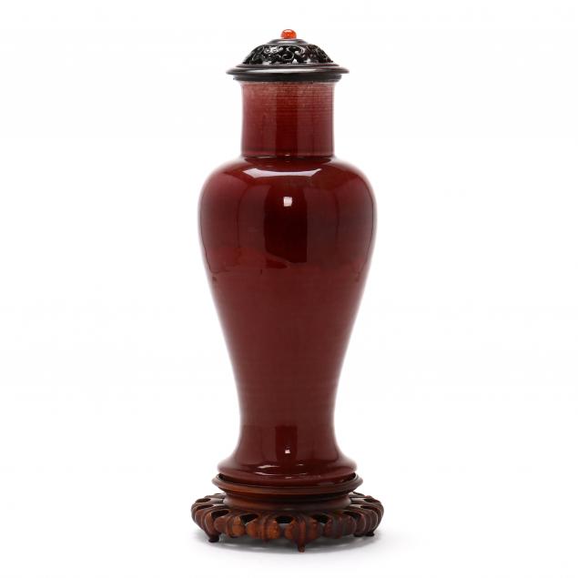 a-tall-chinese-sang-de-boeuf-glazed-porcelain-jar-with-cover