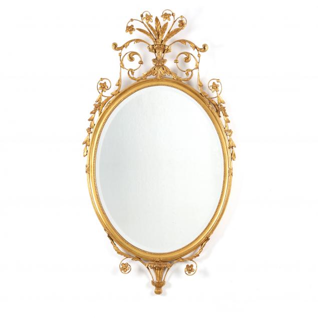 an-adam-style-oval-giltwood-mirror