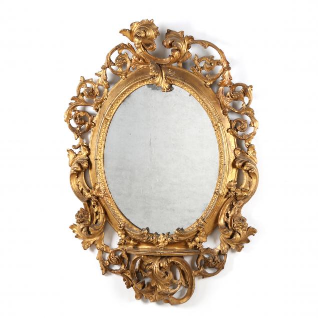 an-italian-rococo-style-oval-giltwood-mirror
