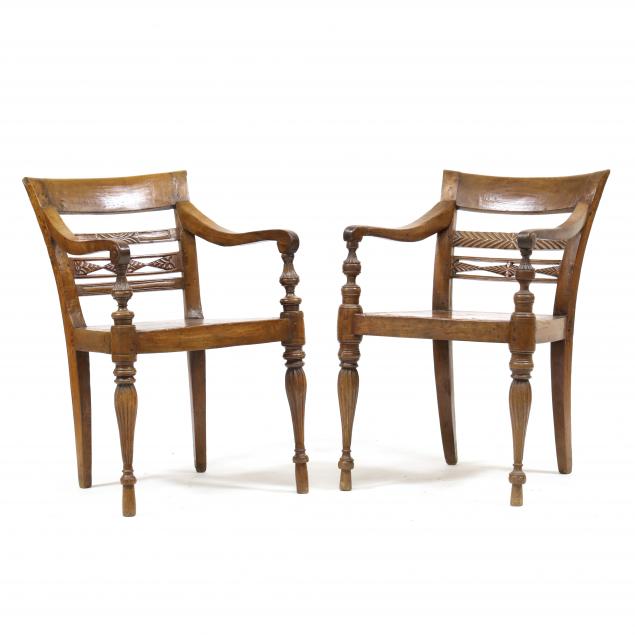 a-pair-of-javanese-teak-chairs